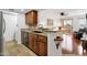 Cozy kitchen with granite countertops open to the living room at 14645 N Fountain Hills Blvd # 208, Fountain Hills, AZ 85268