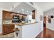 Kitchen featuring stainless appliances and breakfast bar at 14645 N Fountain Hills Blvd # 208, Fountain Hills, AZ 85268