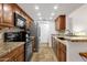 Well-equipped kitchen with granite countertops and sleek appliances at 14645 N Fountain Hills Blvd # 208, Fountain Hills, AZ 85268