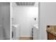 Bright laundry room featuring side by side washer and dryer hookups and storage at 14645 N Fountain Hills Blvd # 208, Fountain Hills, AZ 85268