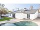 Backyard featuring a sparkling pool, well maintained lawn, and sliding door to the house at 1633 E Wesleyan E Dr, Tempe, AZ 85282