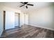 Bright bedroom with a neutral color palette and sliding closet, ideal for a tranquil retreat at 1633 E Wesleyan E Dr, Tempe, AZ 85282