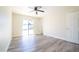 Bright and airy bedroom with large window and door offering ample natural light at 1633 E Wesleyan E Dr, Tempe, AZ 85282