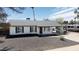 Charming single-story home featuring a low-pitched roof and a covered carport in a well-maintained neighborhood at 1633 E Wesleyan E Dr, Tempe, AZ 85282