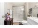 Bathroom featuring a walk-in glass shower, and a white vanity at 17822 N Del Webb Blvd, Sun City, AZ 85373