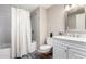 Bathroom featuring a shower tub combo, vanity, and neutral color scheme at 17822 N Del Webb Blvd, Sun City, AZ 85373