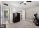 Bedroom featuring a ceiling fan, closet, and neutral color scheme at 17822 N Del Webb Blvd, Sun City, AZ 85373