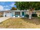 Charming home with a well-maintained front yard, white exterior, blue trim, and curb appeal at 17822 N Del Webb Blvd, Sun City, AZ 85373