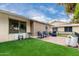 Brick patio featuring lawn, seating, and a peaceful outdoor experience at 17822 N Del Webb Blvd, Sun City, AZ 85373