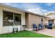 Brick patio featuring lawn, seating, and a peaceful outdoor experience at 17822 N Del Webb Blvd, Sun City, AZ 85373