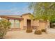 Inviting single-Gathering home featuring desert landscaping and a warm, welcoming facade at 18374 W Stinson Dr, Surprise, AZ 85374