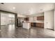Bright kitchen featuring an island, stainless steel appliances, and an open design at 18374 W Stinson Dr, Surprise, AZ 85374