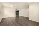 Bright open living room features recessed lights and durable laminate flooring at 18374 W Stinson Dr, Surprise, AZ 85374