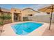Inviting backyard pool, perfect for relaxation and outdoor enjoyment at 18374 W Stinson Dr, Surprise, AZ 85374