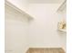 Walk in closet with shelving at 18607 N 125Th Ave, Sun City West, AZ 85375