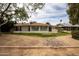 Charming home with desert landscaping and a screened-in porch providing a comfortable outdoor living space with scenic views at 18607 N 125Th Ave, Sun City West, AZ 85375