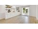 Living area with custom cabinetry and adjacent outdoor views at 18607 N 125Th Ave, Sun City West, AZ 85375