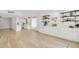 Open concept living area featuring custom cabinetry and access to the kitchen at 18607 N 125Th Ave, Sun City West, AZ 85375