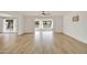Bright living space with wood-look tile and views of the exterior scenery at 18607 N 125Th Ave, Sun City West, AZ 85375
