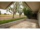 Relaxing covered patio with views of the golf course and desert landscaping, perfect for enjoying the outdoors in comfort at 18607 N 125Th Ave, Sun City West, AZ 85375