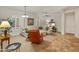 Spacious living room with neutral colors, recessed lighting and large windows overlooking the neighborhood at 20289 N 259Th Ave, Buckeye, AZ 85396