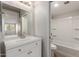 Clean bathroom with white vanity and tile shower at 2301 E University Dr # 393, Mesa, AZ 85213