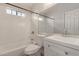 Clean bathroom with shower, bathtub, white subway tile, and a new vanity at 2301 E University Dr # 393, Mesa, AZ 85213