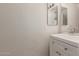 Bright bathroom features vanity with cabinet, and a big mirror at 2301 E University Dr # 393, Mesa, AZ 85213