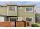 Inviting two-story home featuring a gated entrance, well-maintained landscaping, and a welcoming facade at 2301 E University Dr # 393, Mesa, AZ 85213