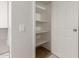 This is a butler's pantry, featuring shelving on the wall at 2301 E University Dr # 393, Mesa, AZ 85213