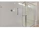 Modern bathroom with glass-enclosed shower and accessible features at 23728 W Magnolia Dr, Buckeye, AZ 85326