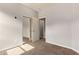 Bedroom with carpet and mirrored closet at 23728 W Magnolia Dr, Buckeye, AZ 85326