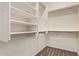 Walk-in closet with shelving and hanging rods at 23728 W Magnolia Dr, Buckeye, AZ 85326
