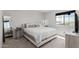 Bedroom with neutral color scheme, a view to other houses and nice decoration at 2377 S 245Th Dr, Buckeye, AZ 85326