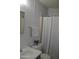 Cozy bathroom featuring a vanity, toilet, and shower with curtain at 2650 W Union Hills Dr # 230, Phoenix, AZ 85027