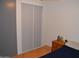 Cozy bedroom with hardwood floors and ample closet space at 2650 W Union Hills Dr # 230, Phoenix, AZ 85027
