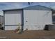 A manufactured home with white siding and blue trim, has a satellite dish on the roof at 2650 W Union Hills Dr # 230, Phoenix, AZ 85027
