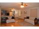 Spacious living room with hardwood floors, open layout, and comfortable seating area at 2650 W Union Hills Dr # 230, Phoenix, AZ 85027