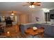 Cozy living room and kitchen area boasts ceiling fans and plenty of natural light at 2650 W Union Hills Dr # 230, Phoenix, AZ 85027