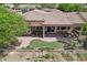 Aerial view of the backyard including patio and putting green providing an overview of the home's outdoor space at 27926 N 130Th Ave, Peoria, AZ 85383