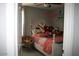 Bright bedroom with a white bed frame, teddy bear chair and lots of toys at 2917 S 121St Ln, Tolleson, AZ 85353