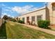 Beautiful single-story home displaying a xeriscaped front yard, quaint walkway and light stucco facade at 3109 W Loma Ln, Phoenix, AZ 85051