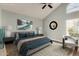 Stylish bedroom featuring a king-size bed, unique art, and a comfortable seating area at 3832 N Gallatin --, Mesa, AZ 85215