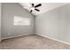 Cozy bedroom features neutral walls, carpet floors, ceiling fan, and window with blinds at 3832 N Gallatin --, Mesa, AZ 85215