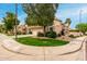Charming home with a well-maintained lawn, mature trees, and a tile roof on a sunny corner lot at 3832 N Gallatin --, Mesa, AZ 85215