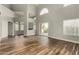 Bright living room boasts high ceilings, clerestory windows, and wood floors at 3832 N Gallatin --, Mesa, AZ 85215