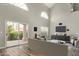 Open-concept living room with large sliding glass doors leading to an outdoor area at 3832 N Gallatin --, Mesa, AZ 85215