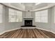 Cozy living room features a corner fireplace and natural light at 3832 N Gallatin --, Mesa, AZ 85215