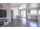 Inviting dining area featuring a sleek table set next to a sliding glass door and stylish decor at 402 W Mohawk Ln, Phoenix, AZ 85027