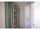 Hallway features a door and a closet with a curtain at 402 W Mohawk Ln, Phoenix, AZ 85027